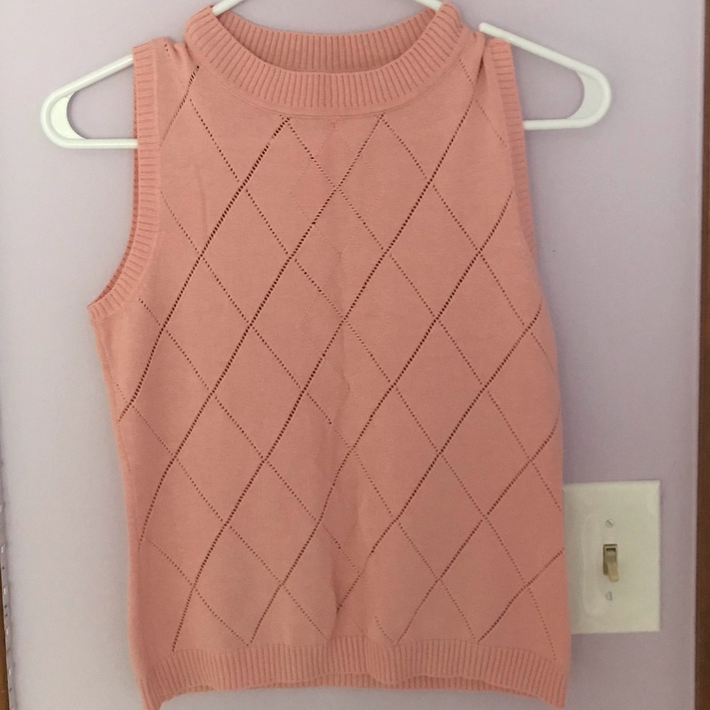 pink sweater vest